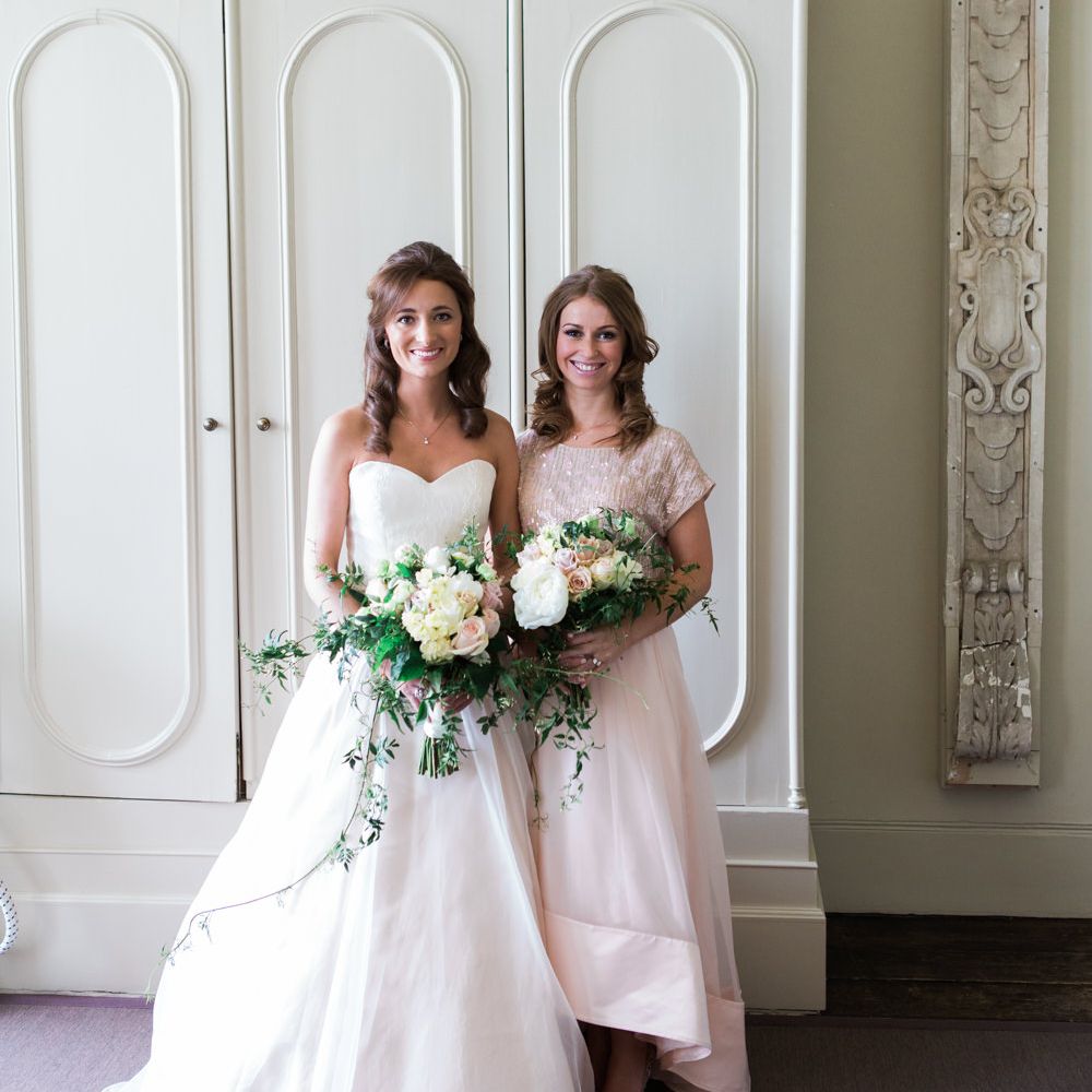 Bride in Sarah Bussey from Ivory & Co. Gown | Bridesmaid in Pink Coast Sequin Top & High Low Skirt Separates | Elegant Blush Pink & White Wedding at Aynhoe Park in Oxfordshire | Lucy Davenport Photography