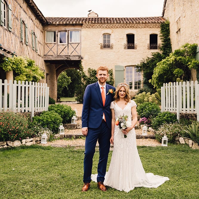 Bride in Eliza Jane Howell Gown & Groom in Navy Paul Smith Suit