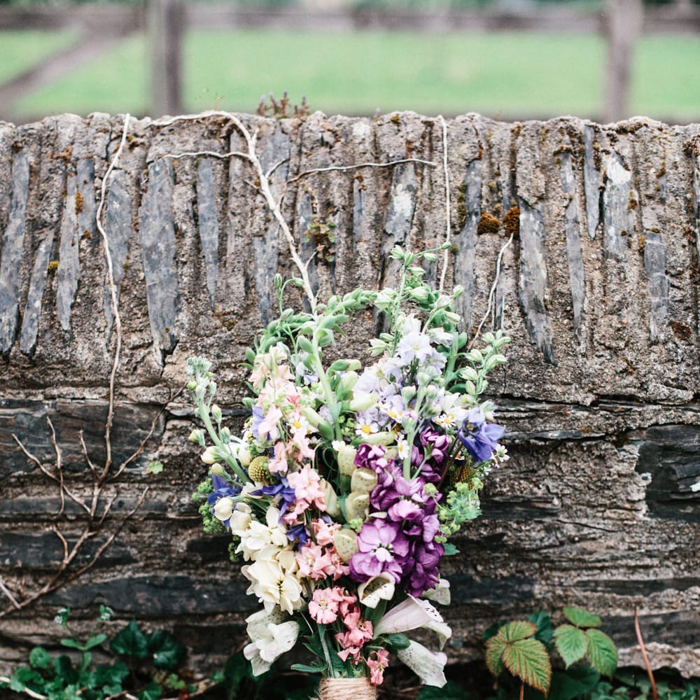 Rime Arodaky Bride For A Rustic Wild Flower Filled Wedding at Anran Devon With Mismatched Bridesmaids Dresses & Images From A Thing Like That Photography