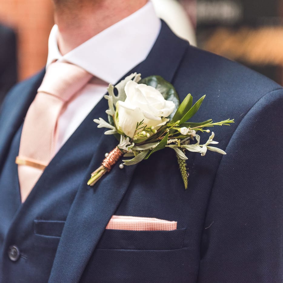 Buttonhole | Groom in Navy Suit | Contemporary City Wedding at People's History Museum & Hope Mill Theatre, Manchester Planned by Alternative Weddings MCR | Babb Photography