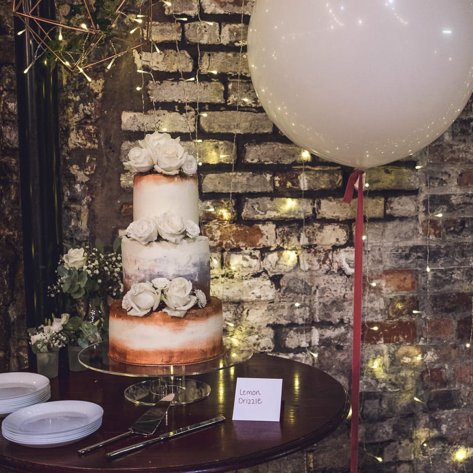 Copper Wedding Cake | Giant Balloon | Contemporary City Wedding at People's History Museum & Hope Mill Theatre, Manchester Planned by Alternative Weddings MCR | Babb Photography