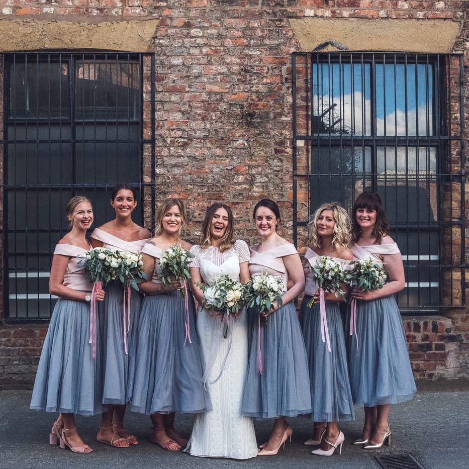 Bridesmaid in Grey Skirt & White Top Separates | Bridalsmaids in Watters Lenora Bridal Gown | Contemporary City Wedding at People's History Museum & Hope Mill Theatre, Manchester Planned by Alternative Weddings MCR | Babb Photography
