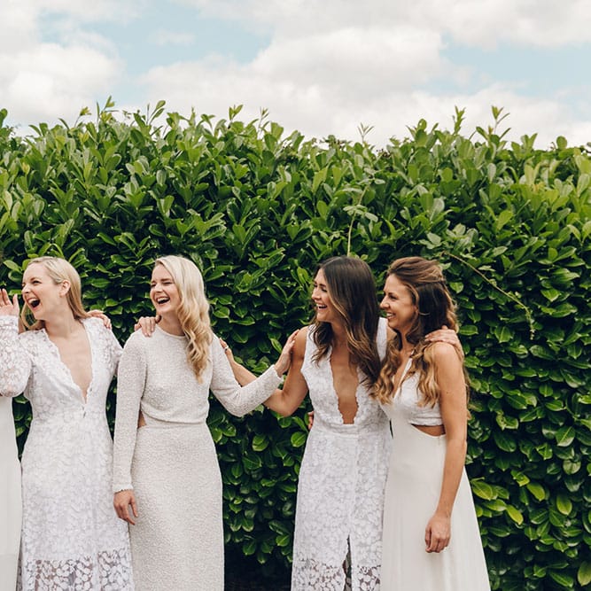 Bride & Bridesmaids in White by Harriet Holling Bridal