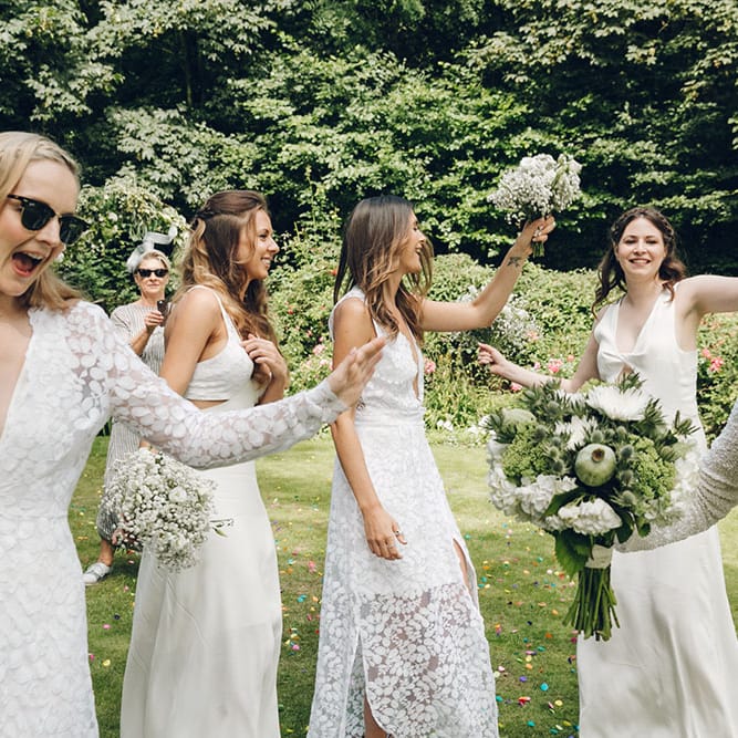Bride & Bridesmaids in White Dresses by Harriet Holling