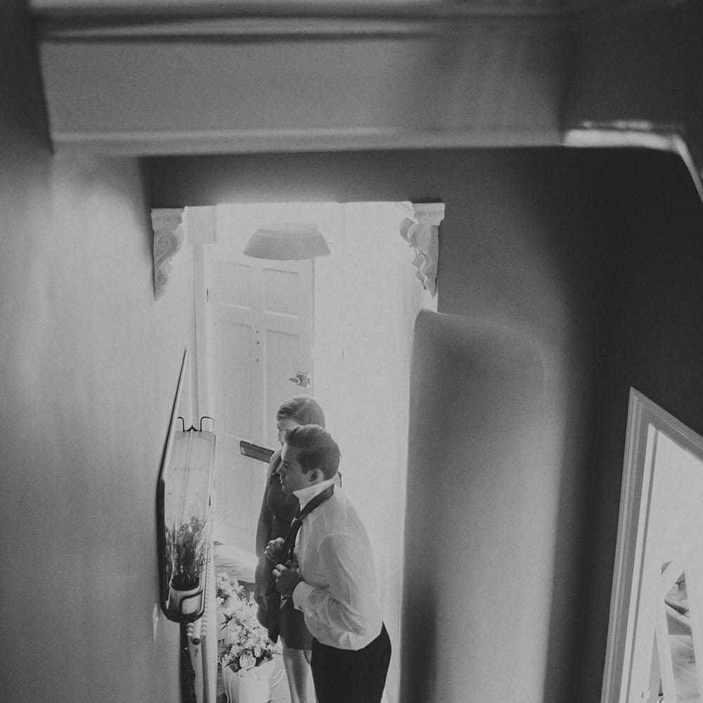 Bride & Groom Getting Ready At Home For Wedding Day