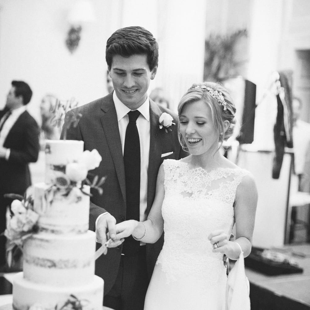 Cutting the Cake | Bride in Pronovias Gown | Groom in Navy J.Crew Suit | Elegant, Pastel Wedding at Hedsor House, Buckinghamshire | M & J Photography | Shoot It Yourself Films