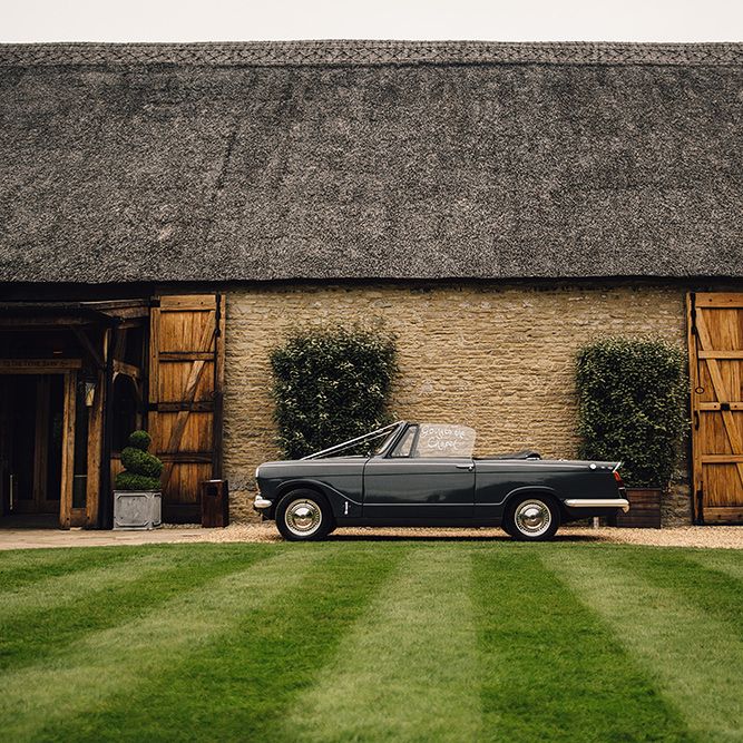 The Tythe Barn Oxfordshire and Vintage Wedding Car