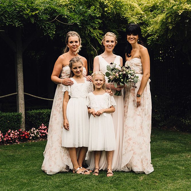 Bridesmaids in Floral Jenny Yoo Dresses from Coco and Kate Boutique
