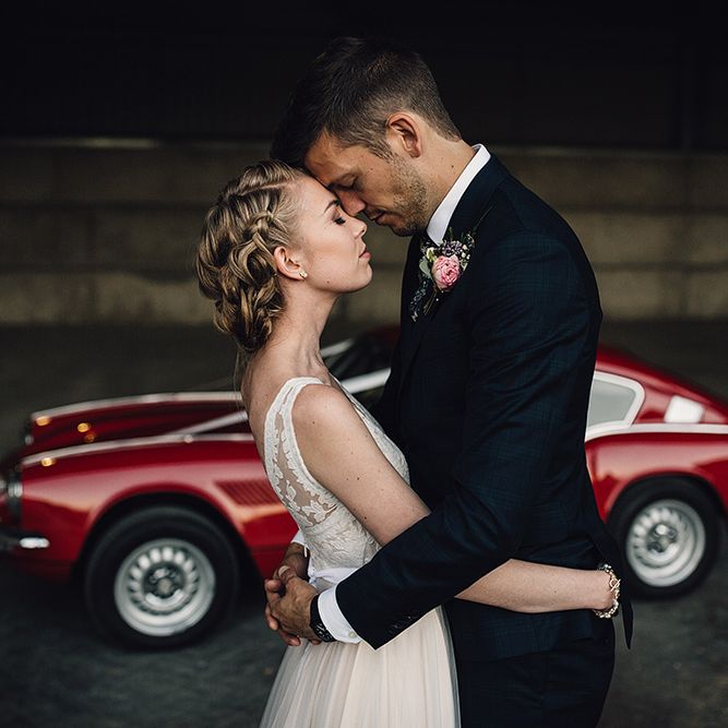 Bride in Catherine Deane Tamsin Wedding Dress & Groom in Paul Smith Suit