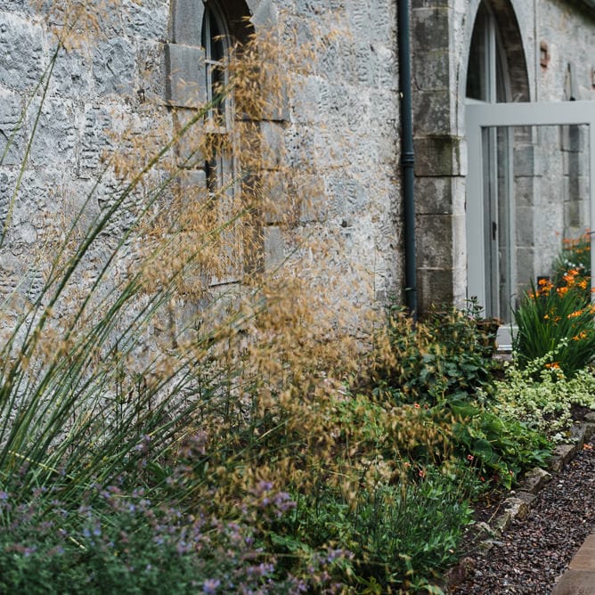 Flower Girls In Peach Dresses // Rainy Tipi Wedding At The Coach House at Kinross House Scotland With Bride In Embellished Bespoke Dress And Images From Photos By Zoe
