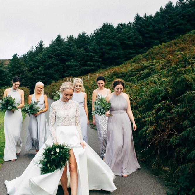 Bride in Emma Beaumont Wedding Dress with Grey Bridesmaids