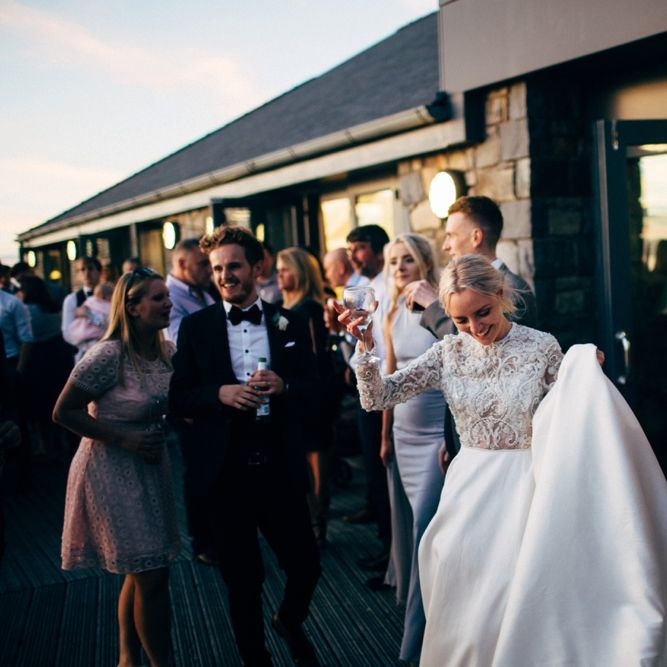 Bride in Emma Beaumont Wedding Dress