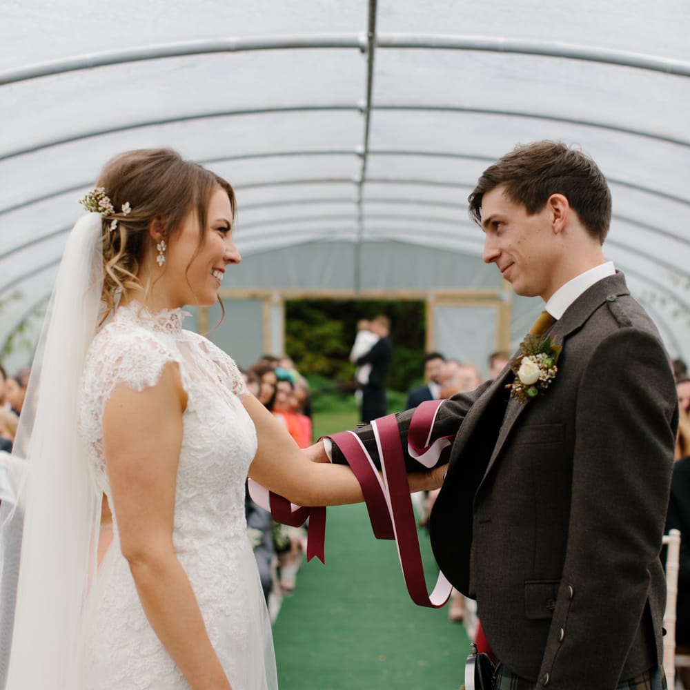 Foliage Filled Wedding At Colstoun East Lothian With Polytunnel Ceremony And Bridesmaids In Dusky Pink & Images From Caro Weiss Photography