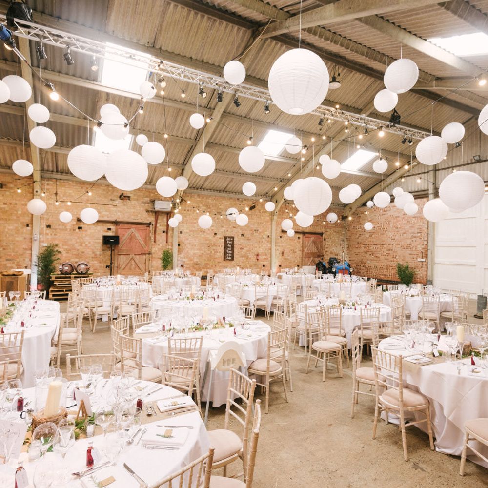 Hanging Paper Lantern Filled Rustic Barn Reception