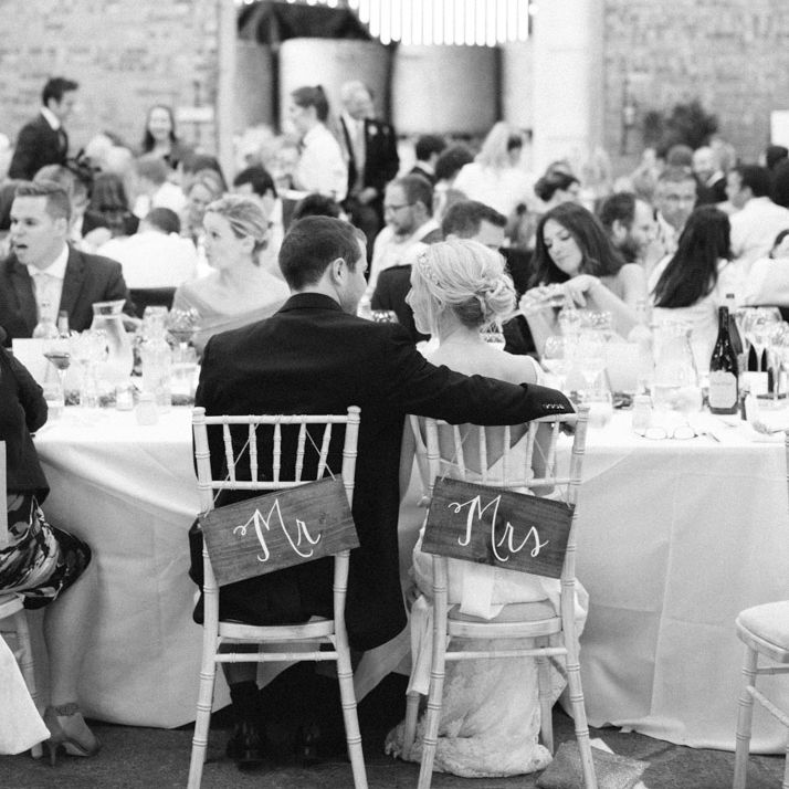 Bride in Charlie Brear Peyton Dress & Augustine Skirt & Groom in Traditional Morning Suit