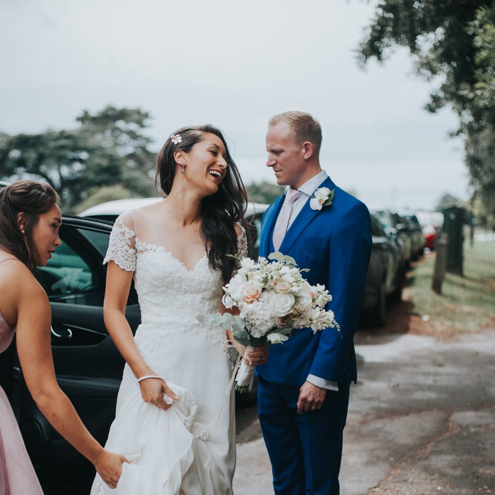 Bride Arrival in White Leaf Bridal Wedding Dress