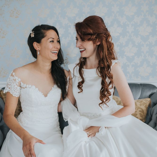 Two Brides in Ocean Bridal Studio Wedding Dress & White Leaf Bridal Wedding Dress