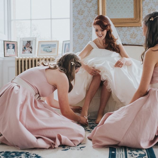 Two Brides in Ocean Bridal Studio Wedding Dress & Bridesmaids in Blush Pink Adele Chi Chi London Dresses