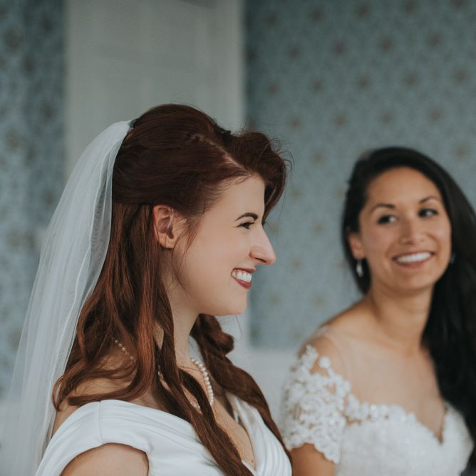 Two Brides in Ocean Bridal Studio Wedding Dress & White Leaf Bridal Wedding Dress