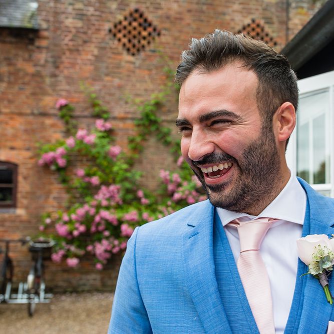 Groom in Blue Hugo Boss Suit
