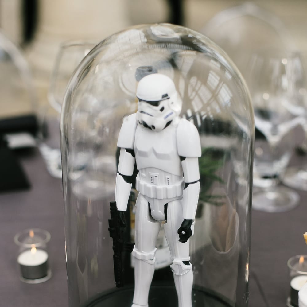 Iconic 80s Figure (Storm Trooper - Star Wars) in Bell Jar Table Centrepiece Wedding Decor | Monochrome Wedding at Syon Park London | Chris Barber Photography | Second Shooter Beatrici Photography