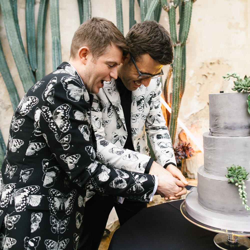 Cutting the Cake | Two Grooms in Alexander McQueen Suits | Monochrome Wedding at Syon Park London | Chris Barber Photography | Second Shooter Beatrici Photography
