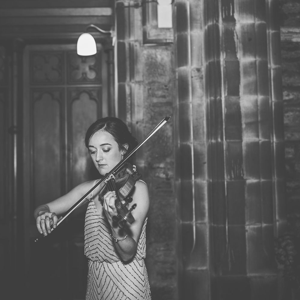 Bridesmaid Playing Strings