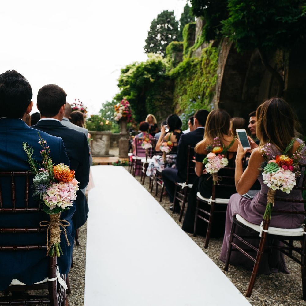 Aisle Chair Back Flowers | Stefano Santucci Studio Photography | Second Shooter Giuseppe Marano | Gattotigre Films