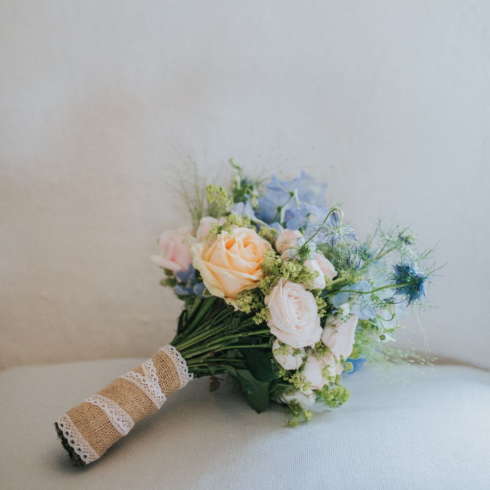 A Cotswold rustic wedding with mismatched bridesmaid dresses