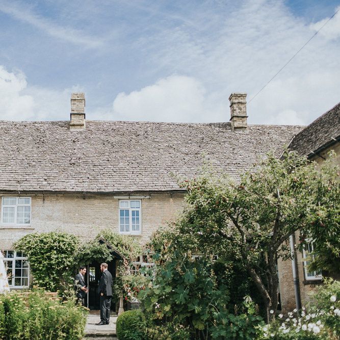 A Cotswold rustic wedding with mismatched bridesmaid dresses