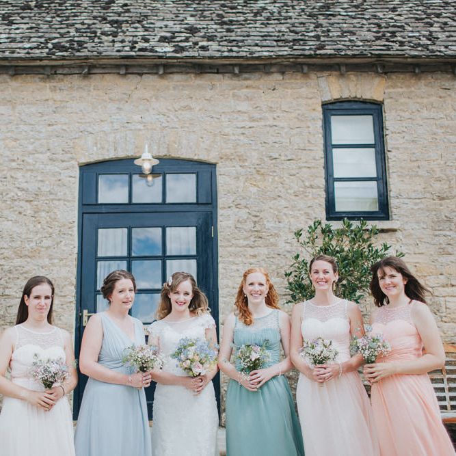 A Cotswold rustic wedding with mismatched bridesmaid dresses