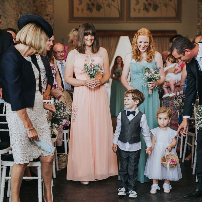A Cotswold rustic wedding with mismatched bridesmaid dresses