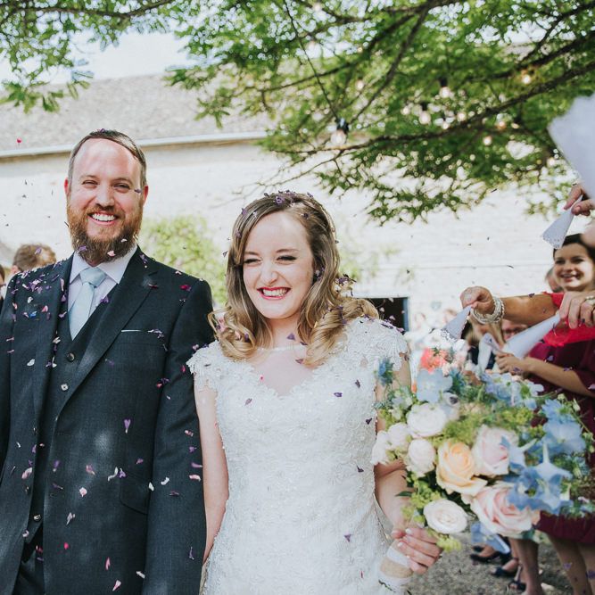 A Cotswold rustic wedding with mismatched bridesmaid dresses