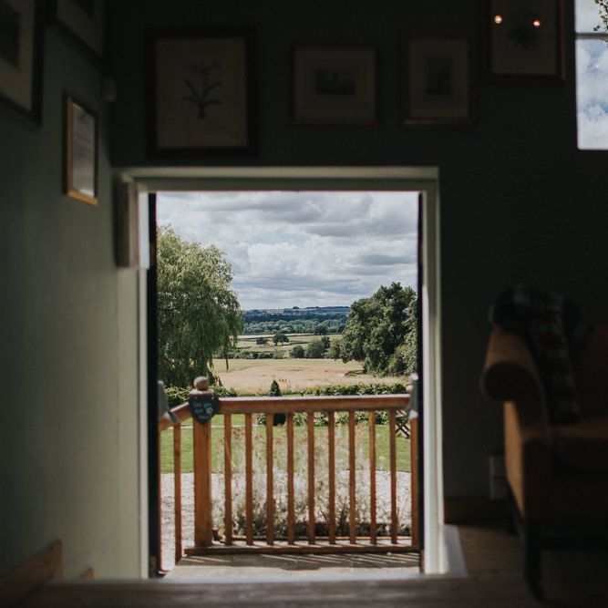 A Cotswold rustic wedding with mismatched bridesmaid dresses