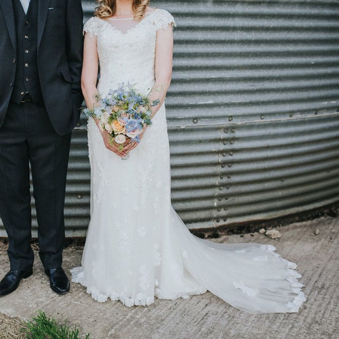 A Cotswold rustic wedding with mismatched bridesmaid dresses