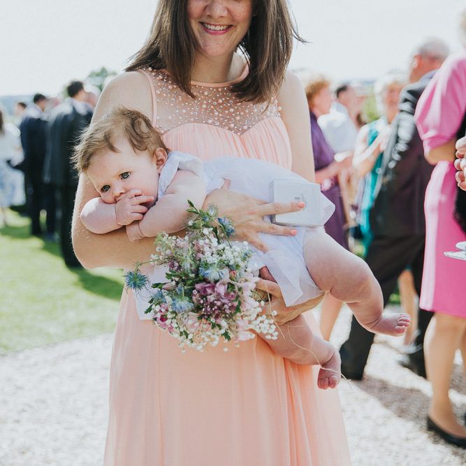 A Cotswold rustic wedding with mismatched bridesmaid dresses