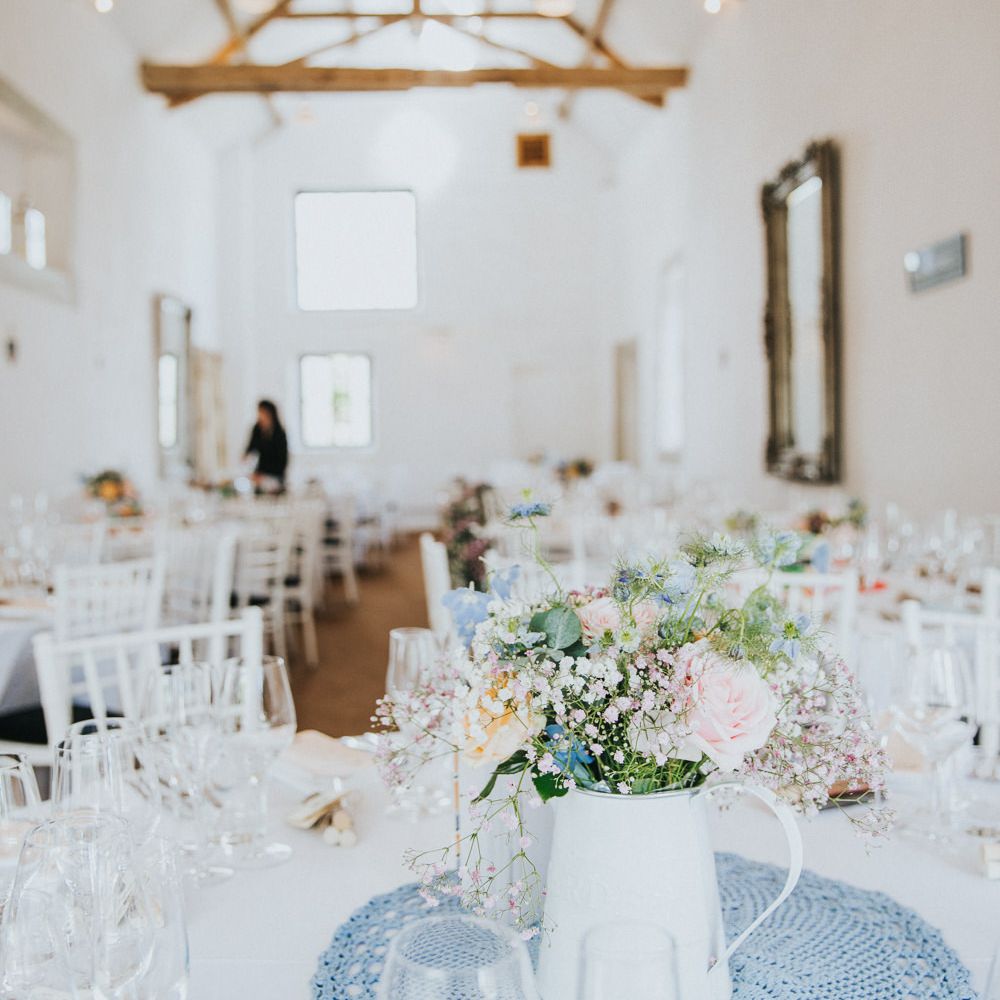 A Cotswold rustic wedding with mismatched bridesmaid dresses