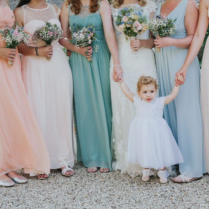 A Cotswold rustic wedding with mismatched bridesmaid dresses