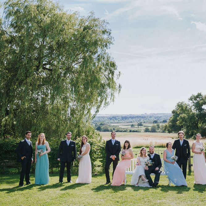 A Cotswold rustic wedding with mismatched bridesmaid dresses