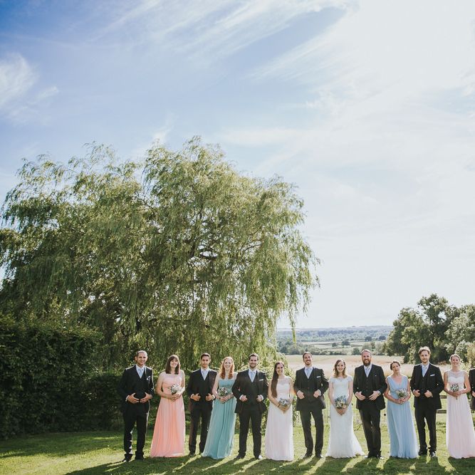 A Cotswold rustic wedding with mismatched bridesmaid dresses