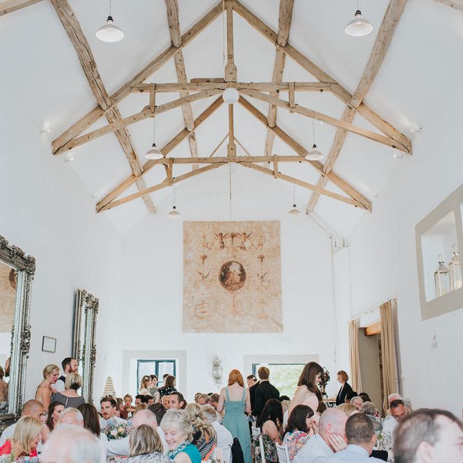 A Cotswold rustic wedding with mismatched bridesmaid dresses