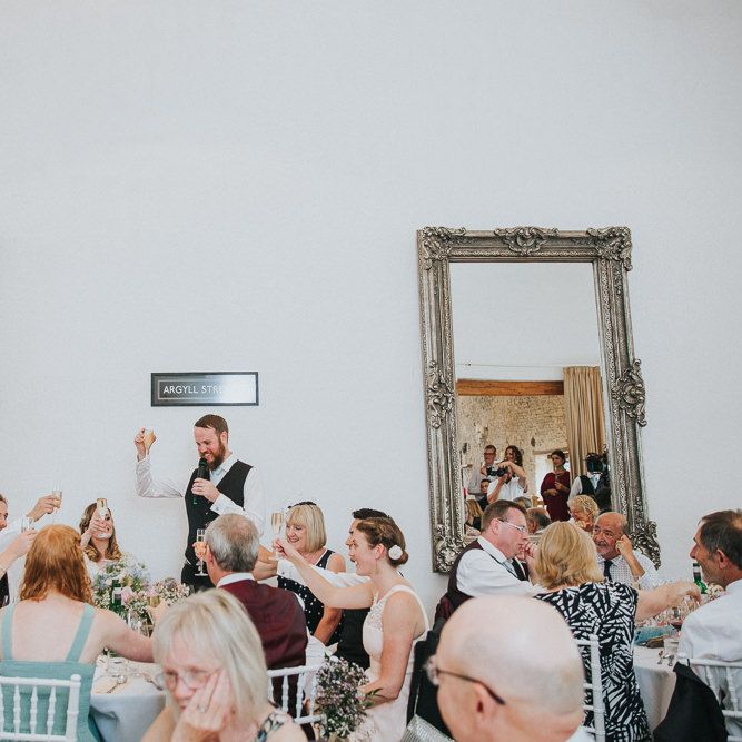 A Cotswold rustic wedding with mismatched bridesmaid dresses