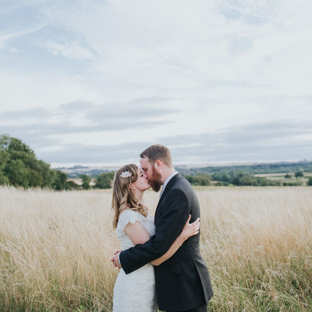 A Cotswold rustic wedding with mismatched bridesmaid dresses