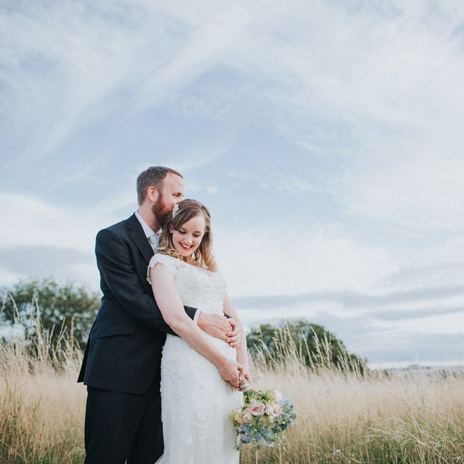 A Cotswold rustic wedding with mismatched bridesmaid dresses