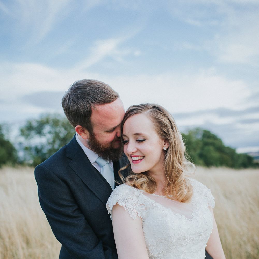 A Cotswold rustic wedding with mismatched bridesmaid dresses