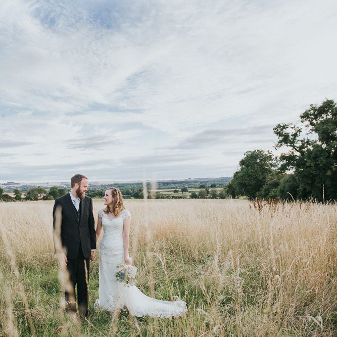 A Cotswold rustic wedding with mismatched bridesmaid dresses