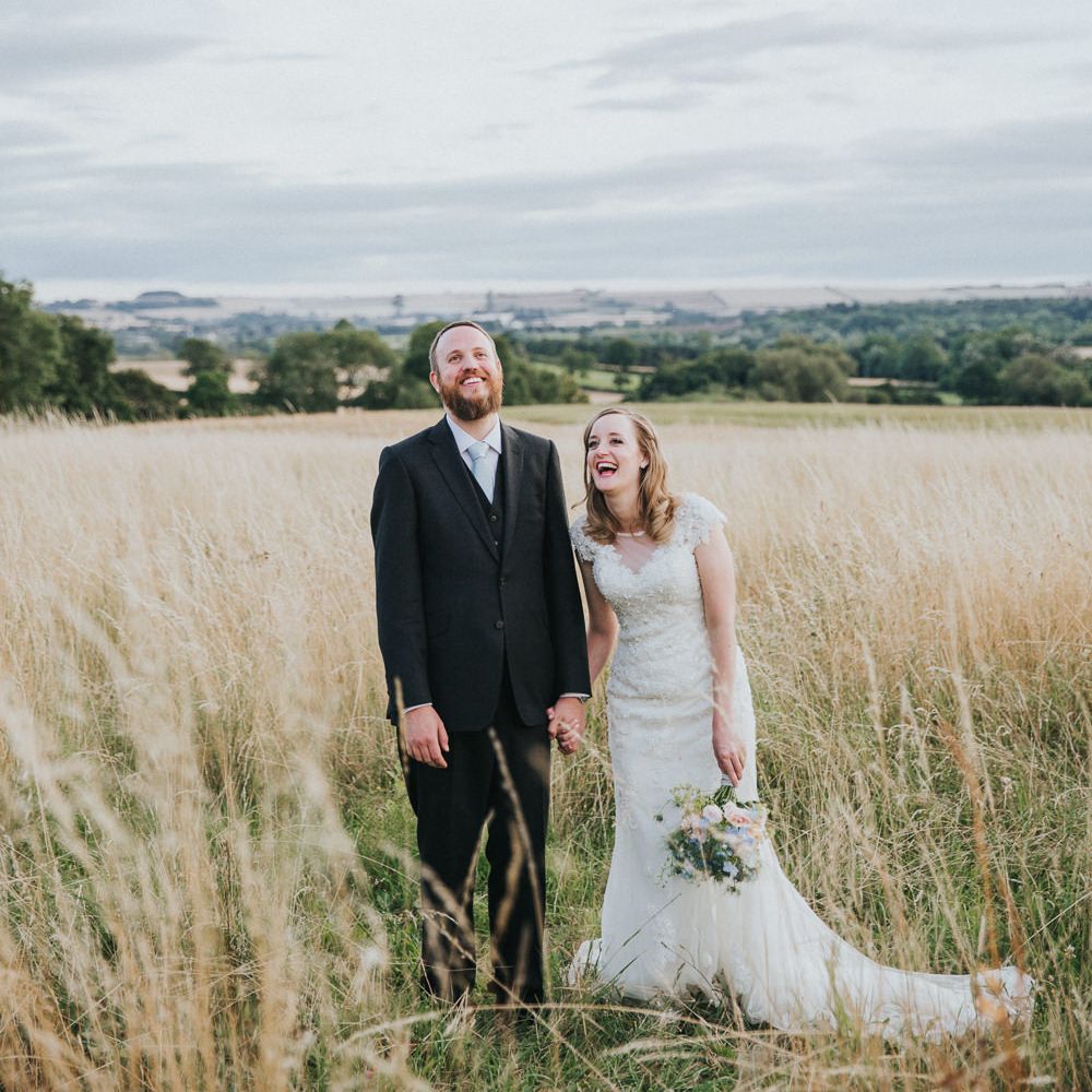 A Cotswold rustic wedding with mismatched bridesmaid dresses