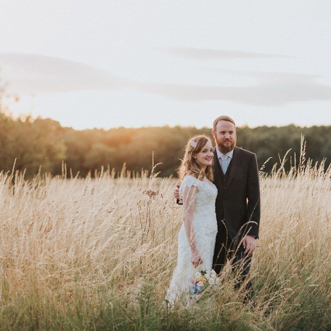 A Cotswold rustic wedding with mismatched bridesmaid dresses