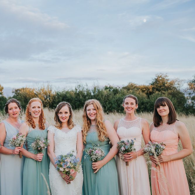 A Cotswold rustic wedding with mismatched bridesmaid dresses