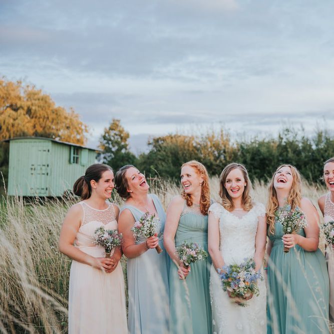 A Cotswold rustic wedding with mismatched bridesmaid dresses